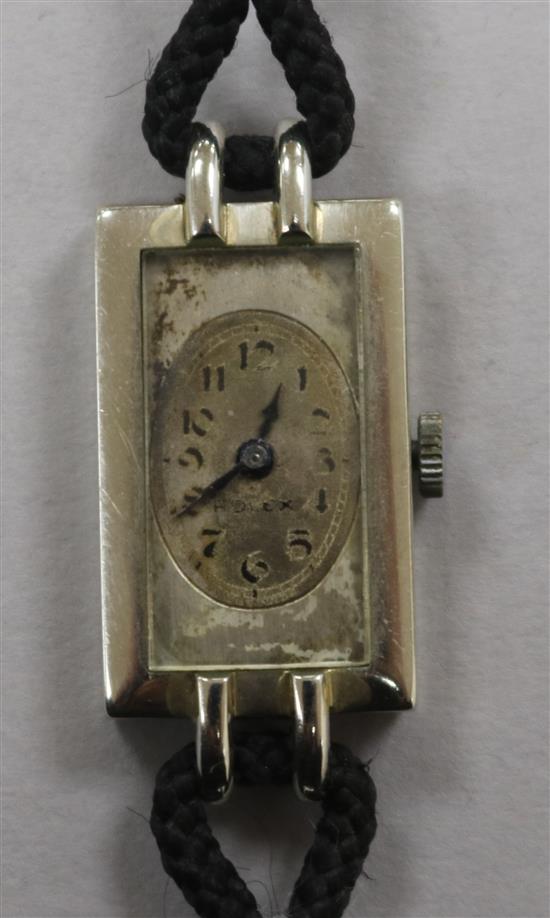 A ladys 18ct white gold Rolex rectangular dial manual wind wrist watch.